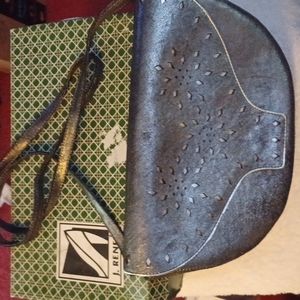 Matching pocket book Bronze in color